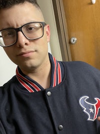 a man wearing a houston texans jacket
