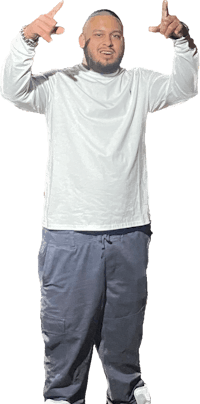 a man posing with his hands in the air